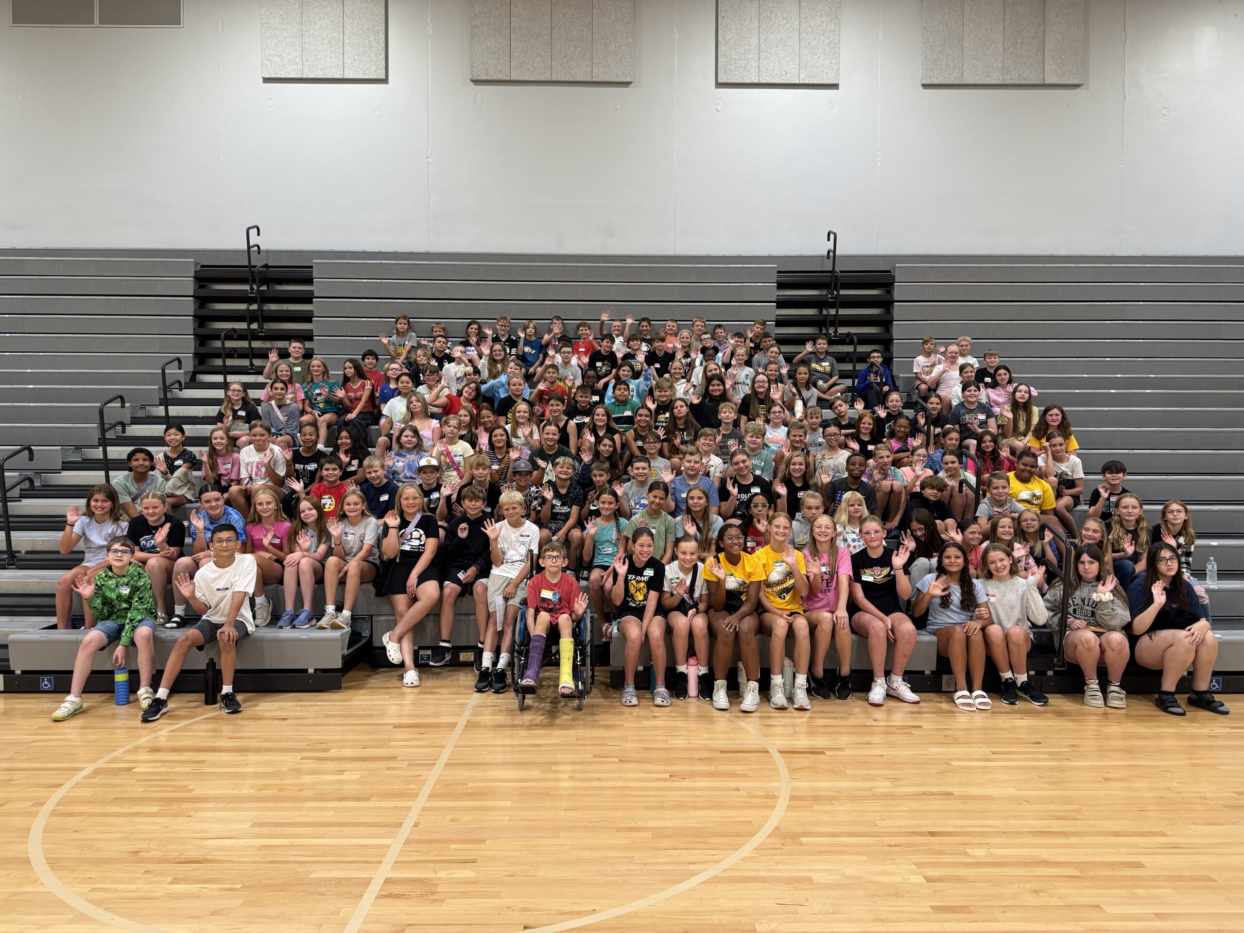 Middle School Mission Transition students waving
