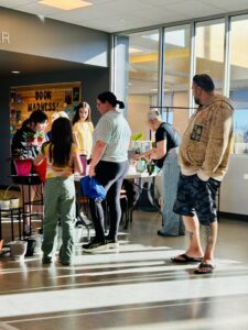 Parents buying plants during Parent/Teacher Conferences