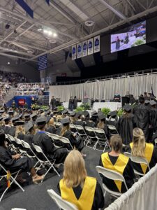 Graduates receiving diplomas