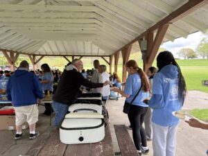 Lions Club serving SCIP Day students picnic lunch