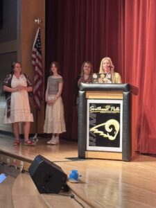 Desiree, Marasco, Peterson and emcee at Fashion show