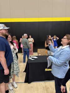 Parents taking pictures at Sophomores/Juniors at Honors Assembly