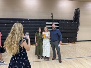 Parents taking pictures at Sophomores/Juniors at Honors Assembly