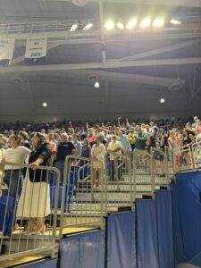 Parents waving 2026 graduation