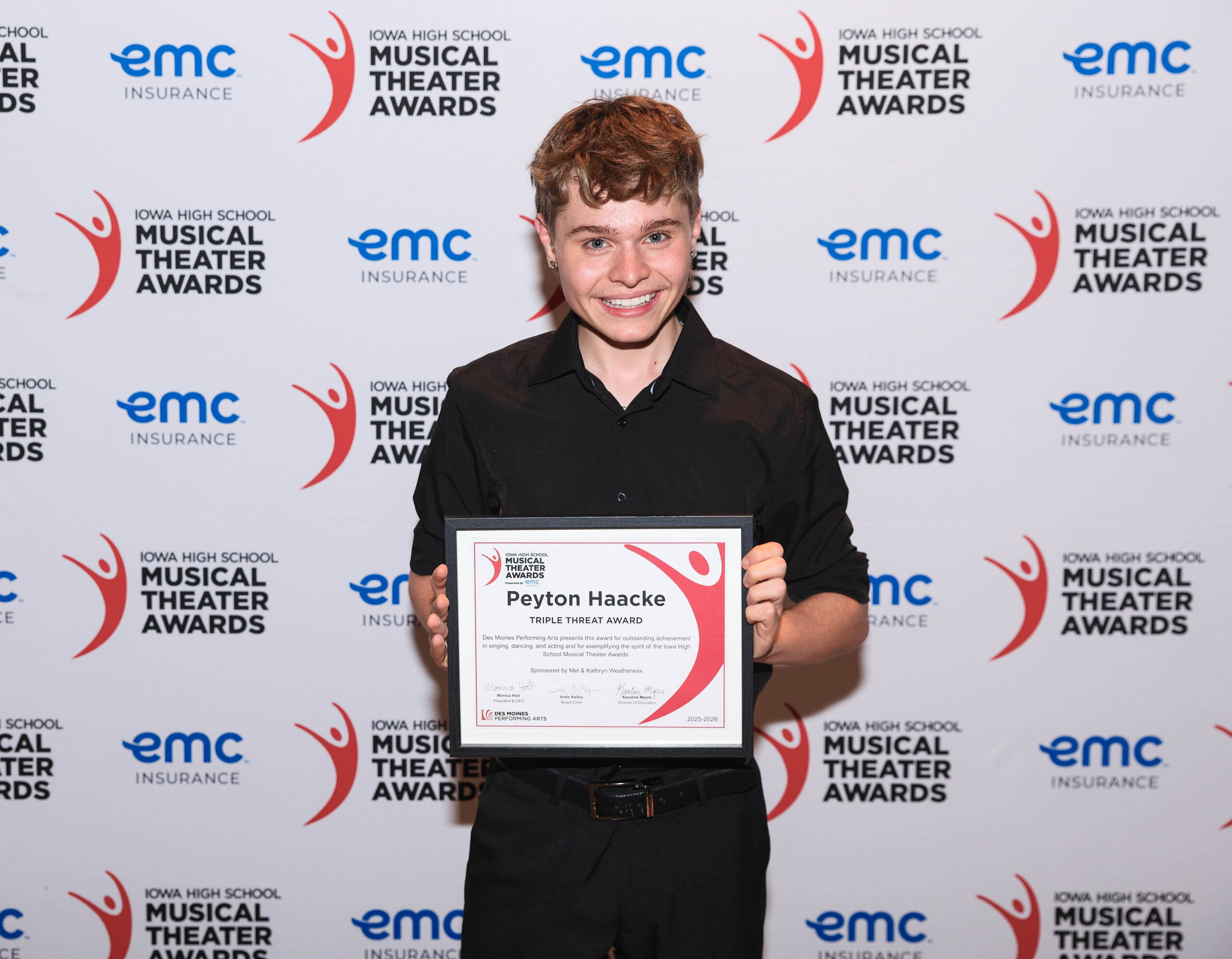 SEP Student, Peyton Haacke, poses with an award after winning the Triple Threat Award.
