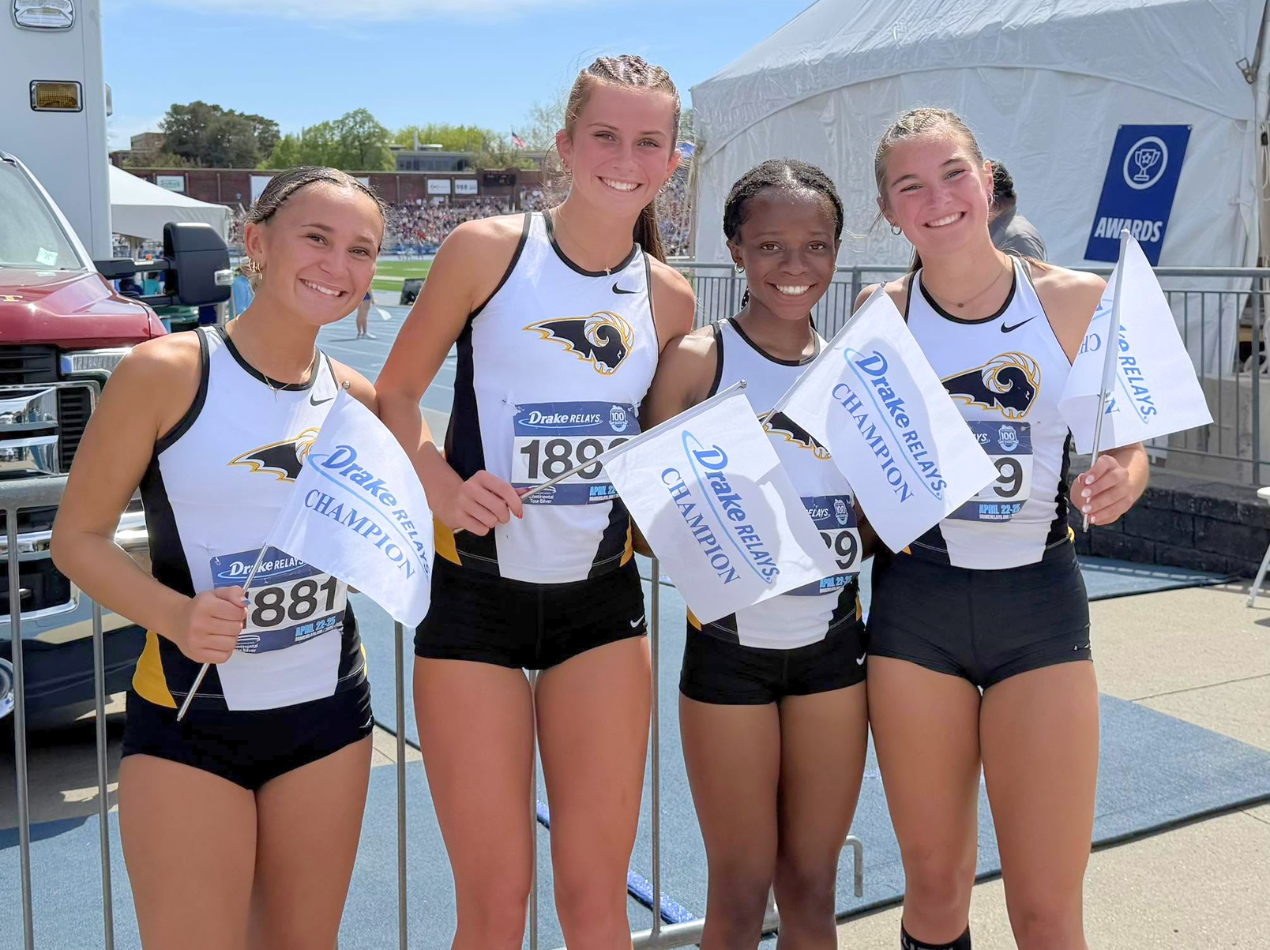 A group photo of the SEP girls track relay team after winning the Drake Relays.